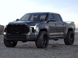A dark grey Toyota Tundra featuring the TIS logo with TIS-TT1 tires and TIS OFFROAD wheels